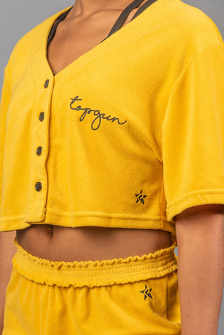 Closeup of yellow TopGun top